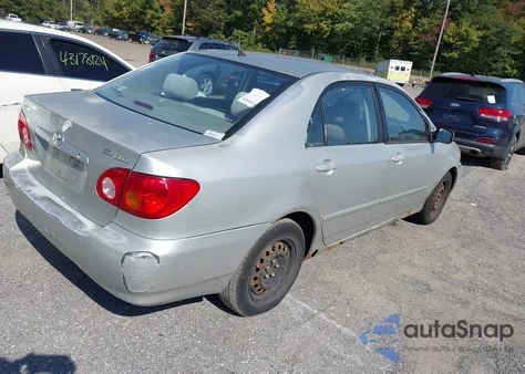 2003 Toyota Corolla Le z USA, uszkodzony, nr VIN 2T1BR32E13C136169